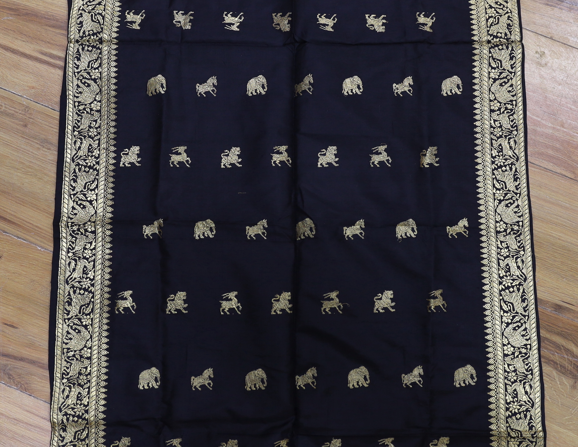 A gold thread Indian embroidered stole, 184 x 57cm